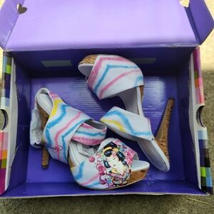 Size 7 Ed Hardy. Never worn.